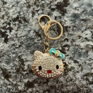 - Hello Kitty Gold Rhinestone Collector Piece.  Bag Charm Keychain clip NWOT.